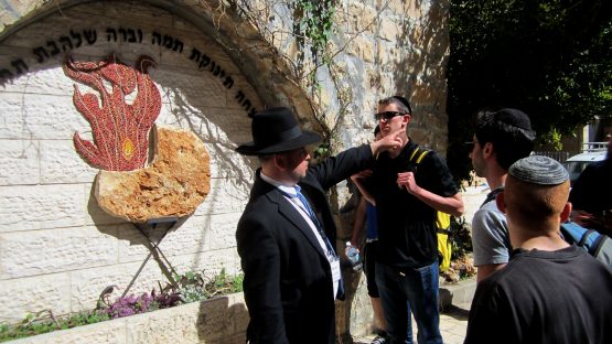 tour in font of Avaroham Avinu Neiborhood