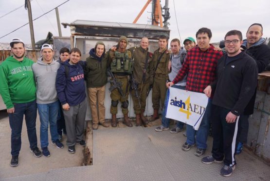 Up in the guard post, learning firsthand from the soldiers guarding in Hevron