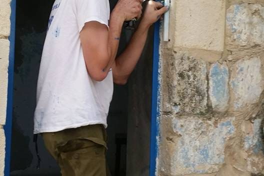 New mezuzahs go up and other work in Hevron today! New mezuzahs go up and other work in Hevron today!