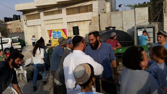 At Beit Machpelah in Hevron - showing support and giving treats to the kids inside.