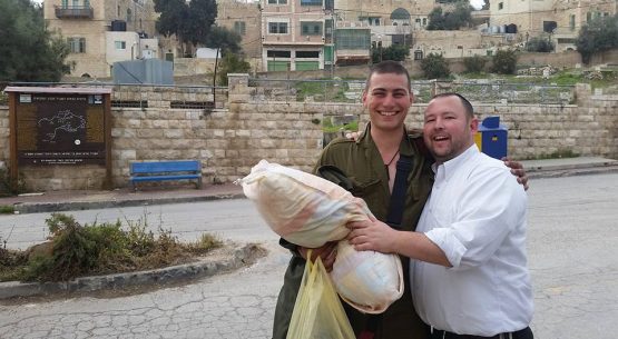 Packer and Michael Ryan in Hebron